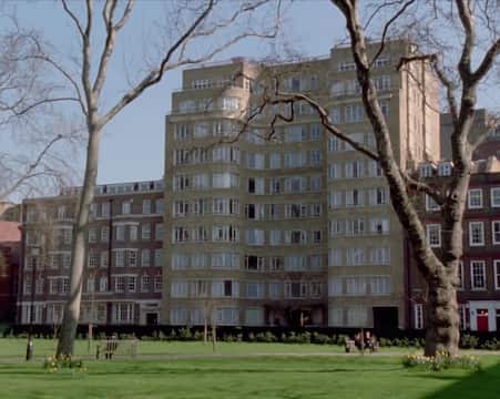 Florin Court at Charterhouse Square, a modernist Art Deco apartment building framed by bare winter trees
